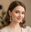 https://cdn.shopify.com/s/files/1/0777/4122/8329/files/crystal-leaf-grace-earrings-8853102.jpg?v=1768322142